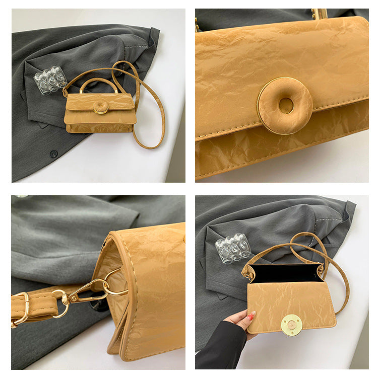 Elegant White Mini Top-Handle Bag with Circular Lock