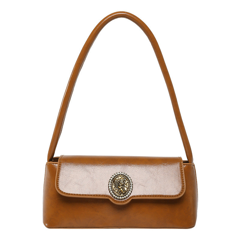 Classic Black Patent Shoulder Bag with Vintage Medallion Clasp