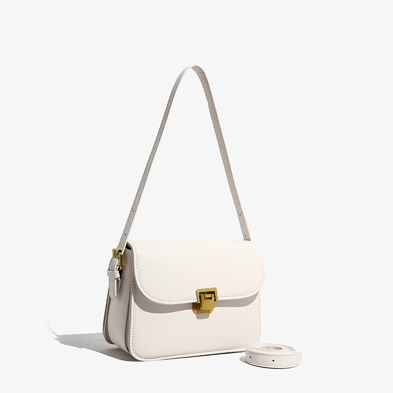 Elegant White Crossbody Bag with Gold Lock Closure