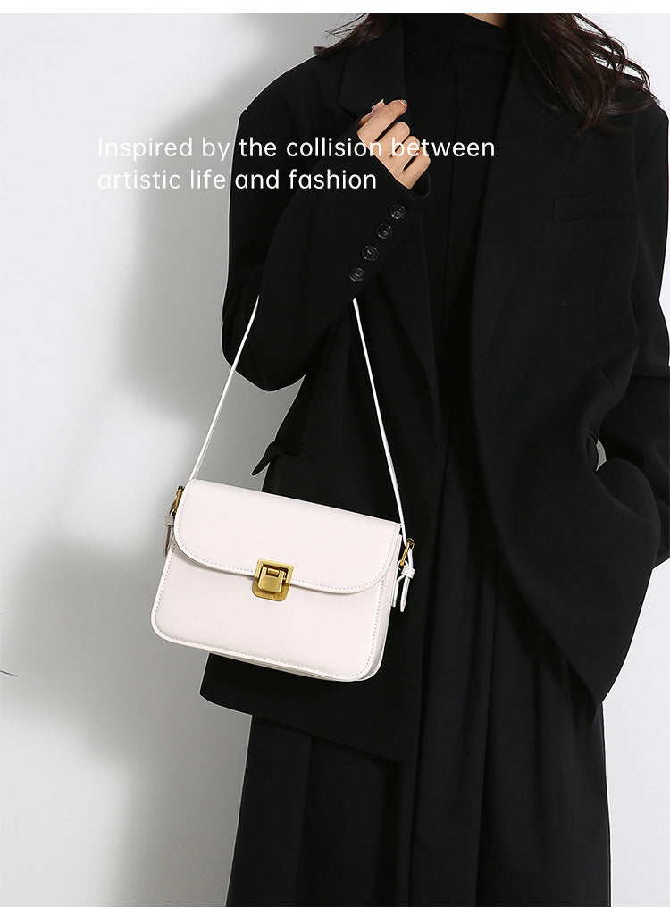 Elegant White Crossbody Bag with Gold Lock Closure