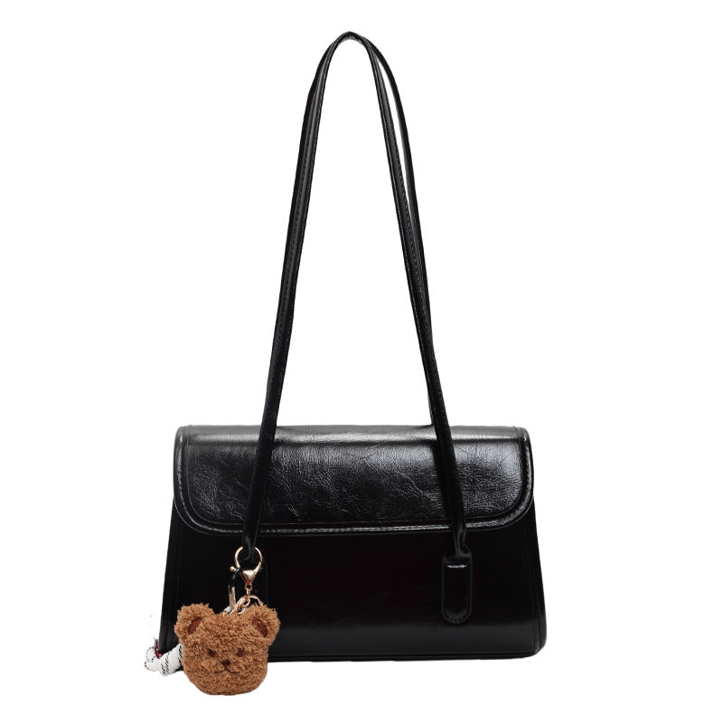 Classic Brown Shoulder Bag with Flap Closure and Teddy Charm