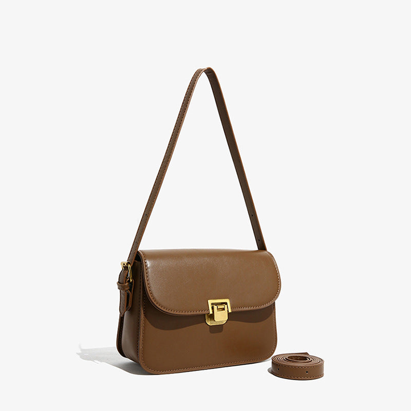 Elegant White Crossbody Bag with Gold Lock Closure
