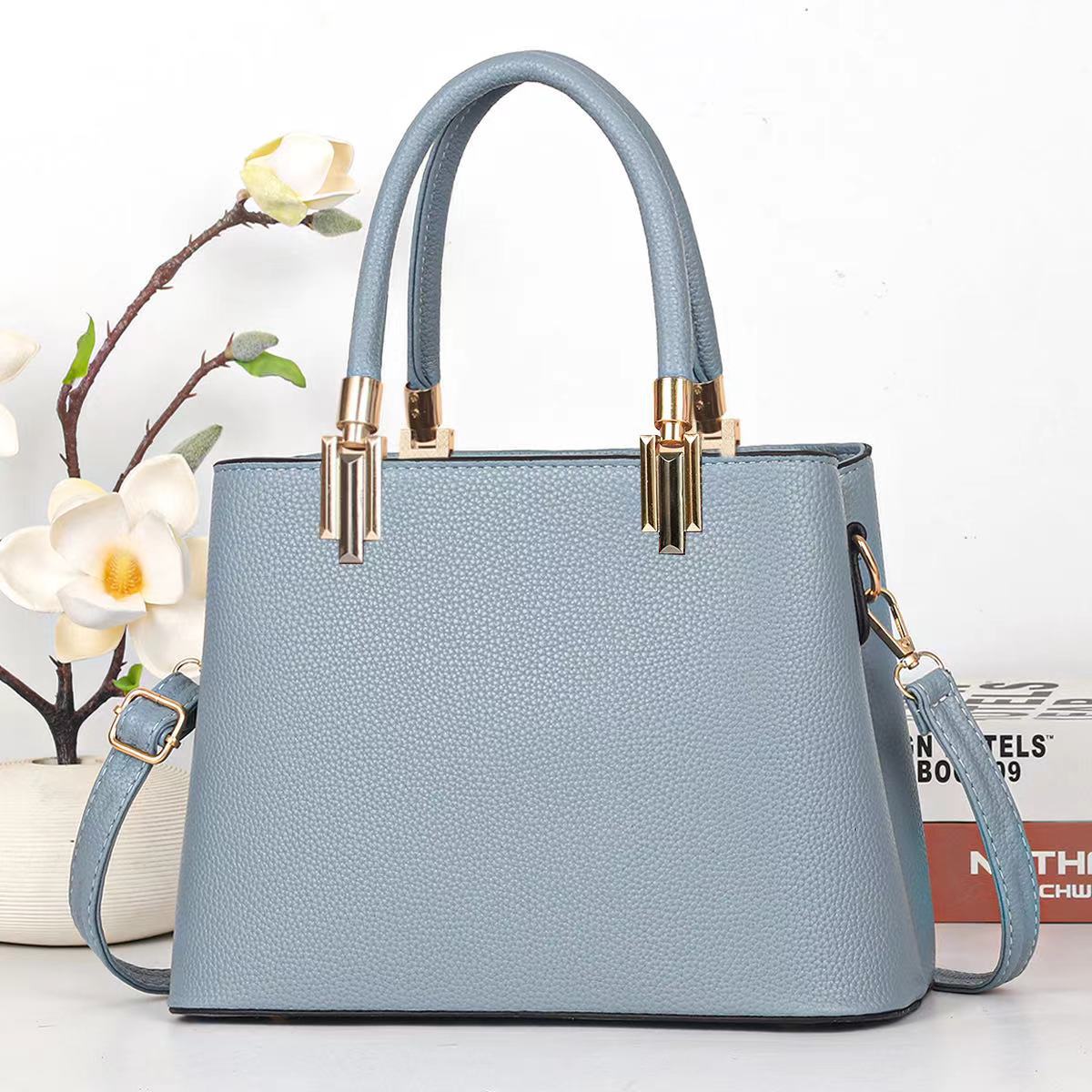 Classic Black Structured Tote Handbag with Gold-Tone Hardware