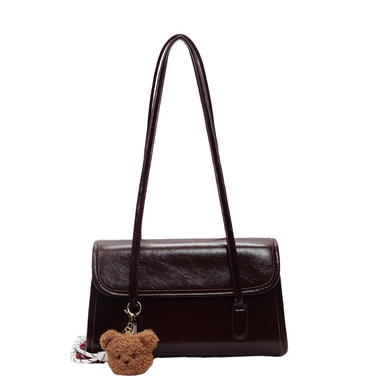 Classic Brown Shoulder Bag with Flap Closure and Teddy Charm