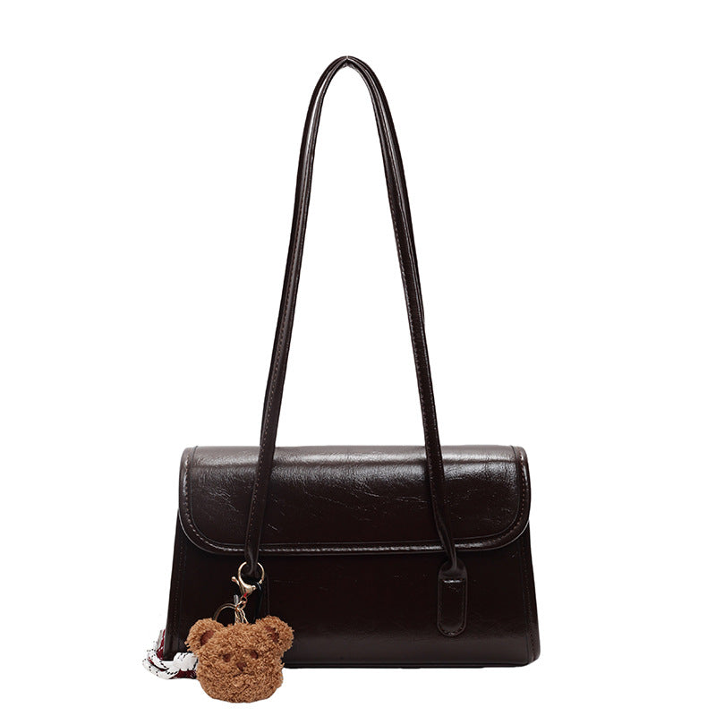 Classic Brown Shoulder Bag with Flap Closure and Teddy Charm