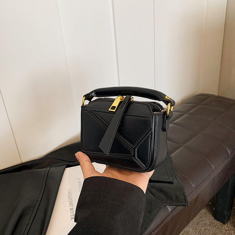 Classic Black Mini Top-Handle Crossbody Bag with Gold Hardware