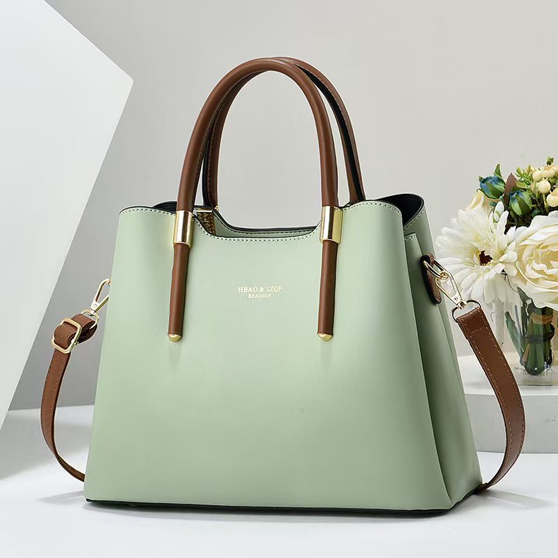 Elegant Cream Tote Handbag with Dual Brown Handles & Gold Hardware