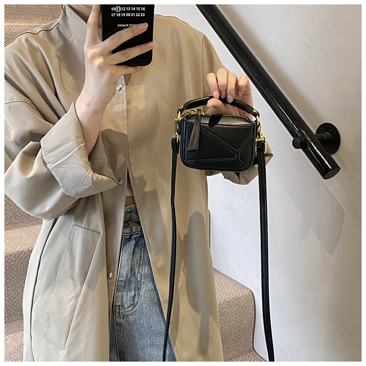 Classic Black Mini Top-Handle Crossbody Bag with Gold Hardware