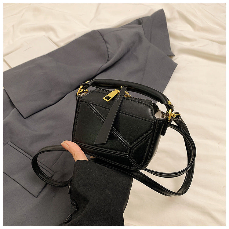 Classic Black Mini Top-Handle Crossbody Bag with Gold Hardware