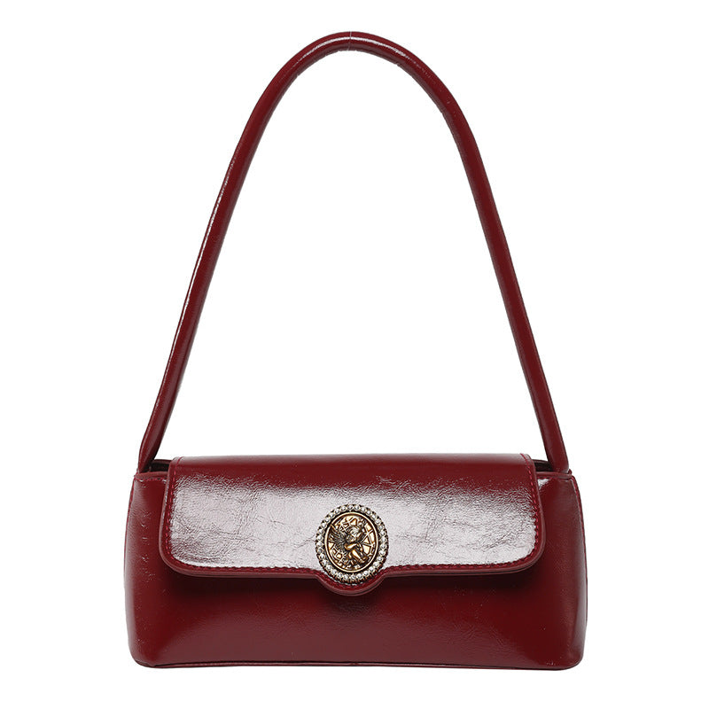 Classic Black Patent Shoulder Bag with Vintage Medallion Clasp