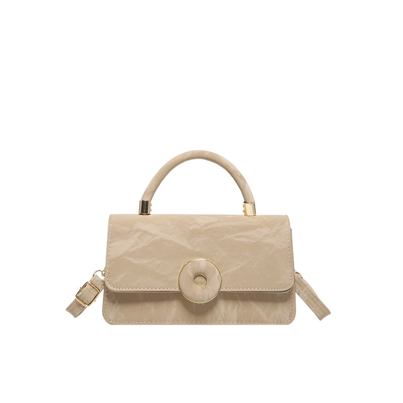 Elegant White Mini Top-Handle Bag with Circular Lock