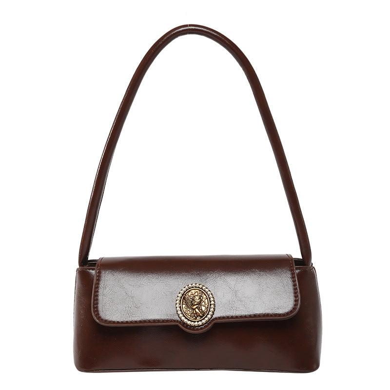 Classic Black Patent Shoulder Bag with Vintage Medallion Clasp