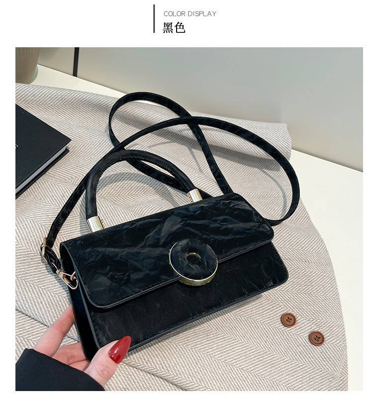 Elegant White Mini Top-Handle Bag with Circular Lock