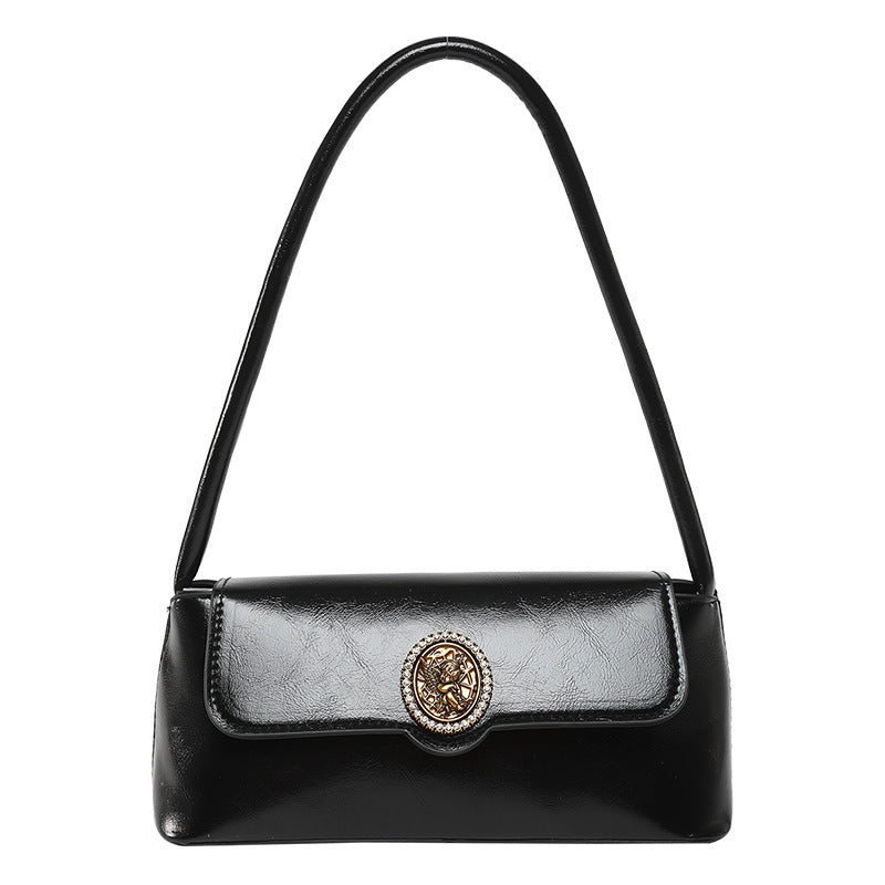 Classic Black Patent Shoulder Bag with Vintage Medallion Clasp