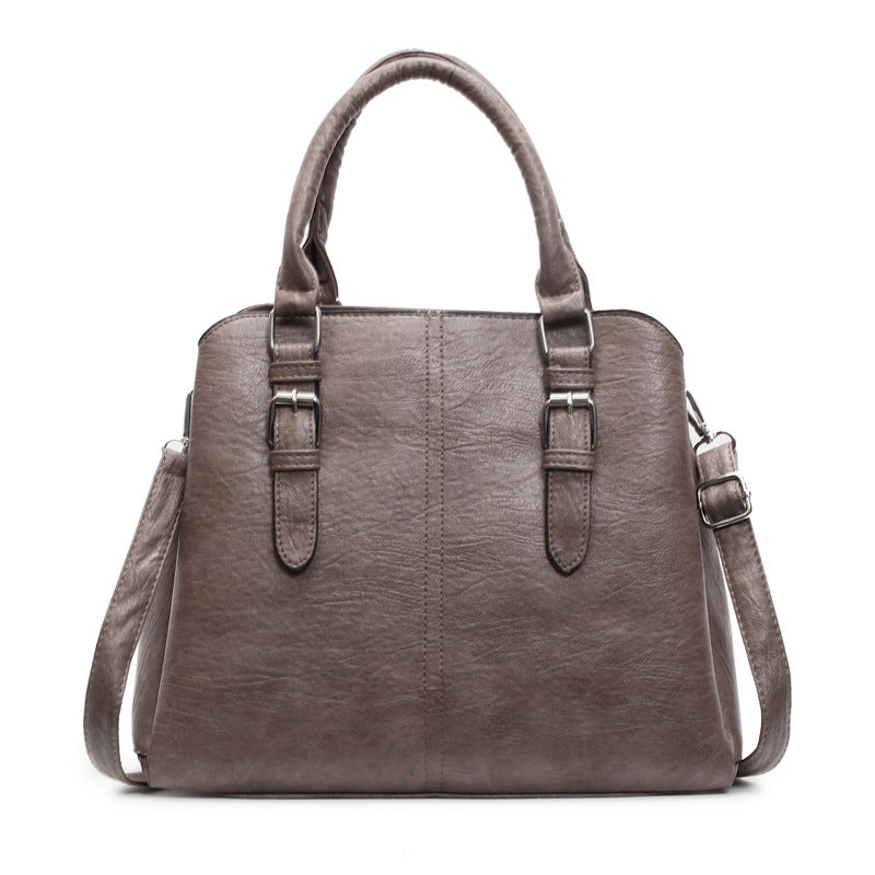 Elegant Grey-Brown Handbag with Dual Handles & Adjustable Shoulder Strap
