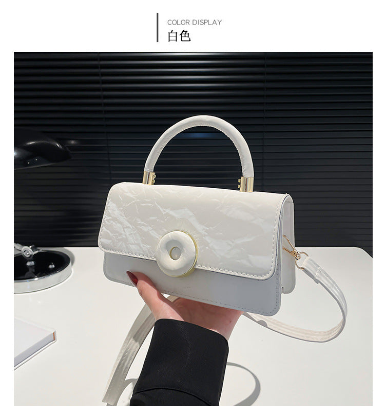 Elegant White Mini Top-Handle Bag with Circular Lock