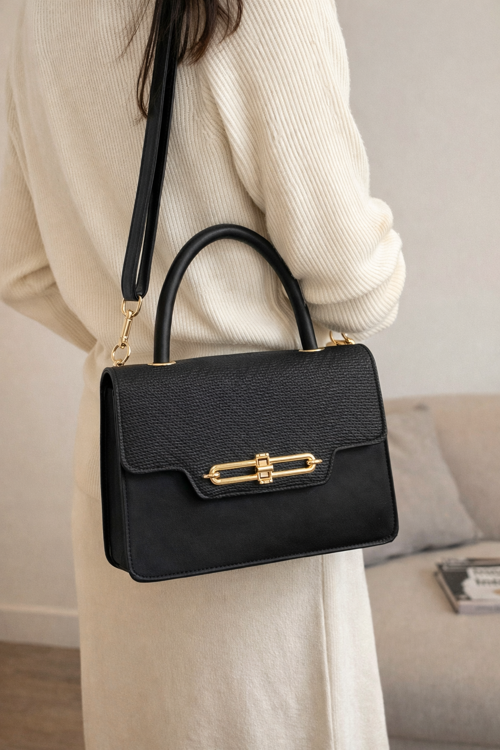 Elegant Black Leather Top-Handle Handbag with Gold Hardware