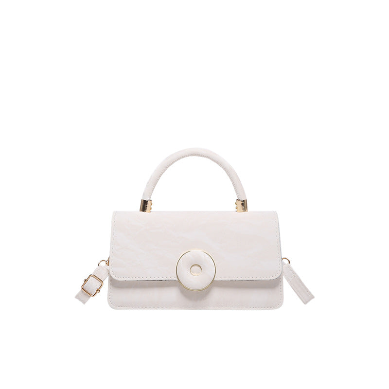Elegant White Mini Top-Handle Bag with Circular Lock