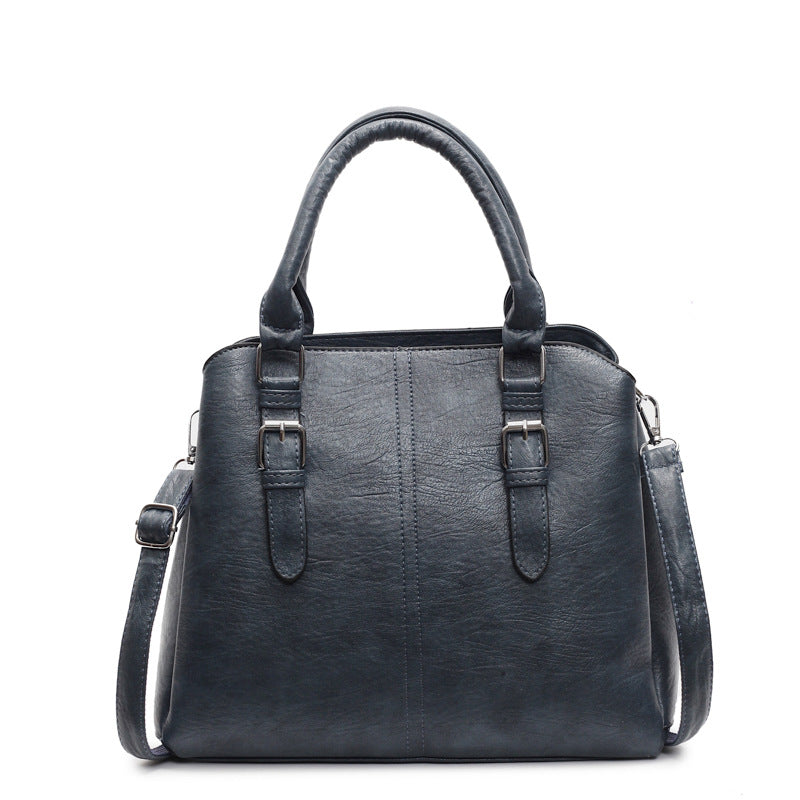 Elegant Grey-Brown Handbag with Dual Handles & Adjustable Shoulder Strap